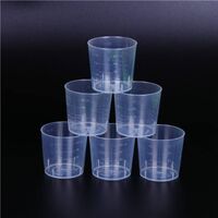 Disposable plastic measuring cup for medicine transparent