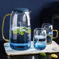 pyrex glass pitcher hand made mouth blown borosilicate glass pitcher with silicone lid and nice color from Chinese supplier
