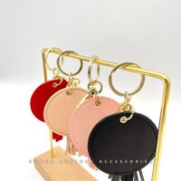 Personlized PU Vegan Saffiano Piel Cuero PU Leather Circle Keyring Tassel Leather Keychain