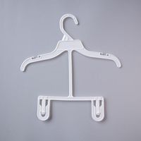 Inexpensive kids suit white plastic hanger