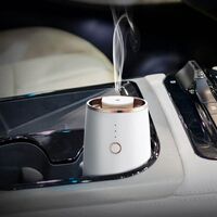 SCENTA Commercial Luxury Waterless Car Fragrance Battery Powered Wireless Charging Car Air Purifier