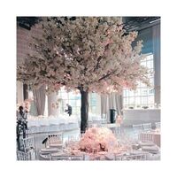 White artificial cherry blossom wedding centerpiece