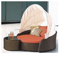 Outdoor wicker patio espresso canopy bed with root red cushions