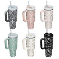 Laser leopard white lid 40 oz Adventure Quencher travel mug with handle and straw the quencher 2.0 soft matte