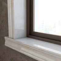 Stone facade white marble slab door and window sills