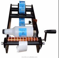 Economical simple manual round bottle labeling machine (manual round bottle labeling machine, labeling machine)