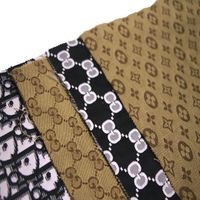 Manufacturing customized 100% polyester 50D exquisite designer logo jacquard fabric