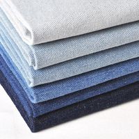 Hot selling 100% cotton twill dyed denim clothing fabric fashion washed cotton jeans fabric