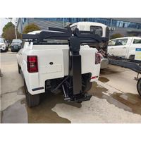 Wrecker pallet trailer located under wheel lifter for pickup truck